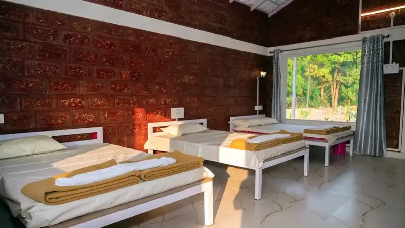 A Red Stone Cottage at Dandeli Mango Mist